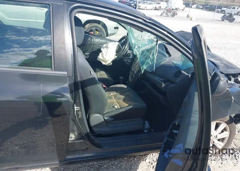 2009 Toyota Yaris z USA, uszkodzony, nr VIN JTDBT903591344901